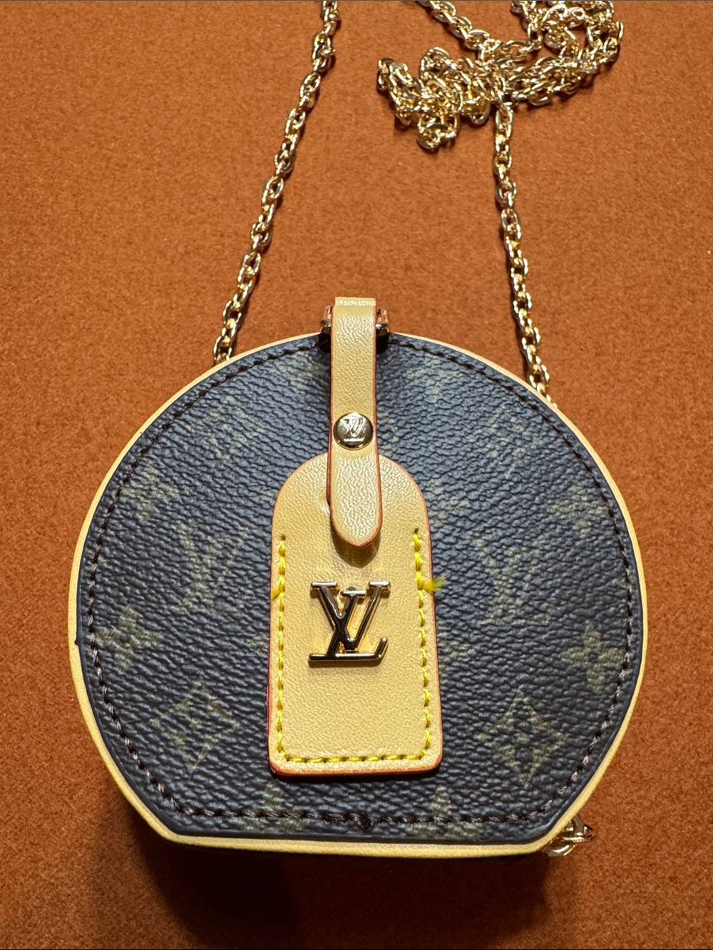 Round Min Chain Crossbody Bag in Monogram Canvas and Vachetta